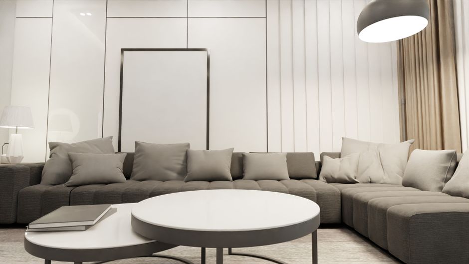 A stylish and comfortable modern living room with a minimalist design and neutral tones.